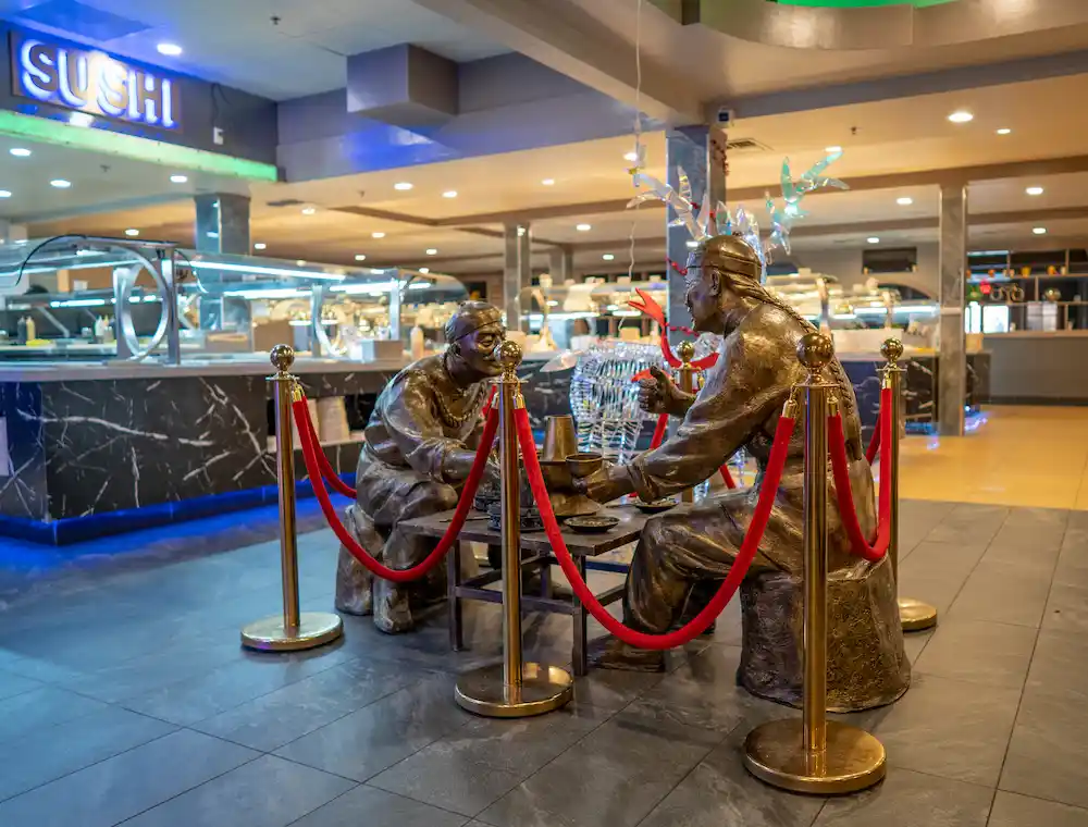 The bronze statues inside the Hibachi Buffet- Sushi & Grill